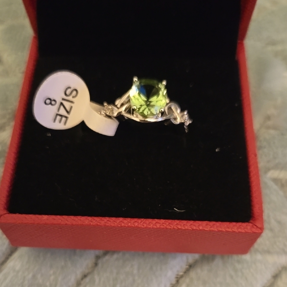 Elegant 9.25 Sterling Silver Ring with Green Gemstone